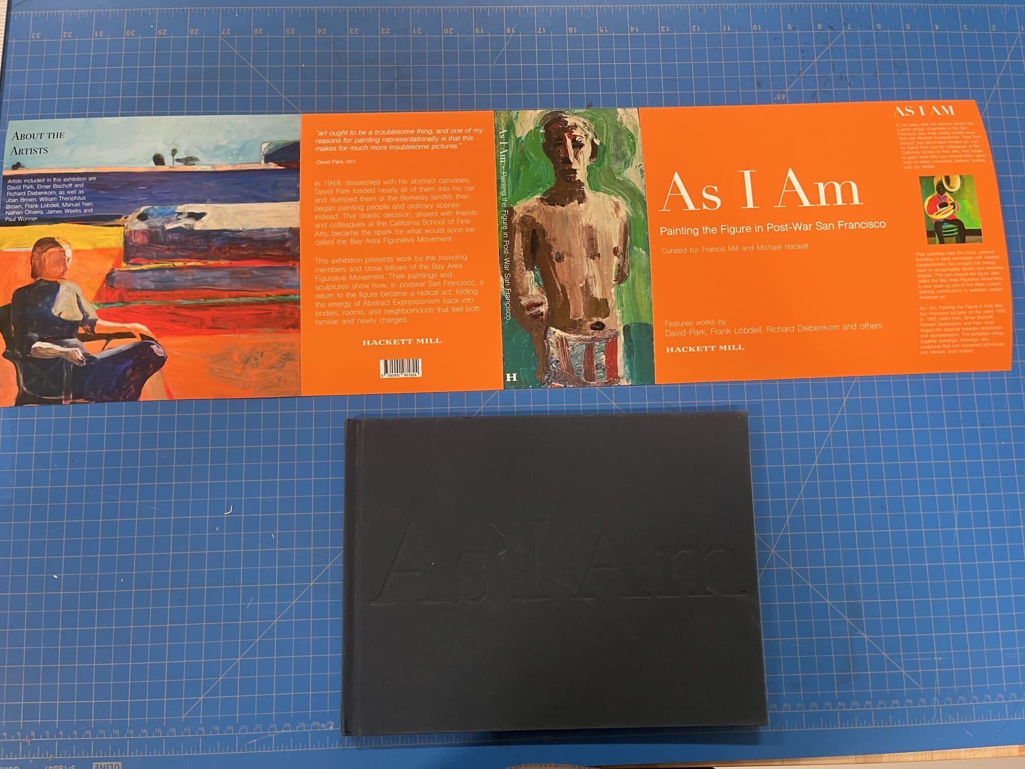 Case and printed wrap side by side on the mat